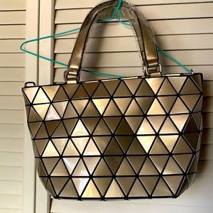 Gold geometric triangle design handbag